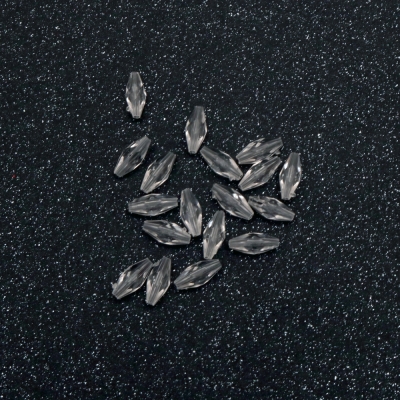 Мънисто кристал продълговато 12х5 мм дупка 1 мм прозрачно -50 грама ± 340 броя