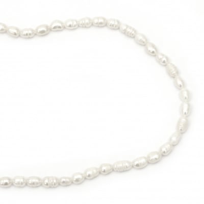 Наниз мъниста естествена перла 5~6x7~10 мм дупка 0.5 мм цвят крем ~47 броя