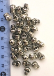 Мънисто метализе череп 9x7x6 мм дупка 1.5 мм сребро -50 грама ~190 броя