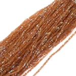 Наниз от кристални мъниста 3x4x3 мм дупка 1 мм фасетиран прозрачен с AB покритие цвят карамел дъга ~130 броя