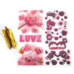 Целофанов плик 12x27 см МИКС Любов 4 дизайна с връзка -50 броя 