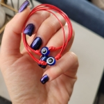 Гривна с червен конец и синьо око