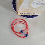 Гривна с червен конец и синьо око