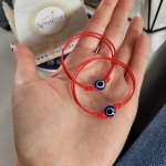 Гривна с червен конец и синьо око