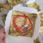 Гривна с червен конец и синьо око