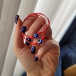 Гривна с червен конец и синьо око